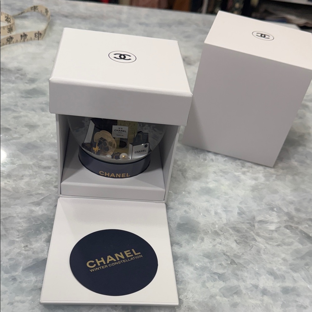 CHANEL Winter Constellation Snow Globe with Gold and Black Accents - Picture 2 of 5